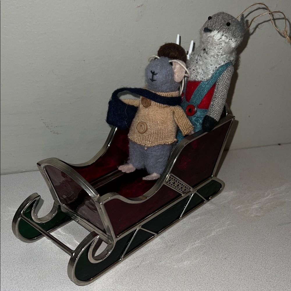 Stained glass Festive Red and Green Sleigh Decor with 2 ornament passengers.